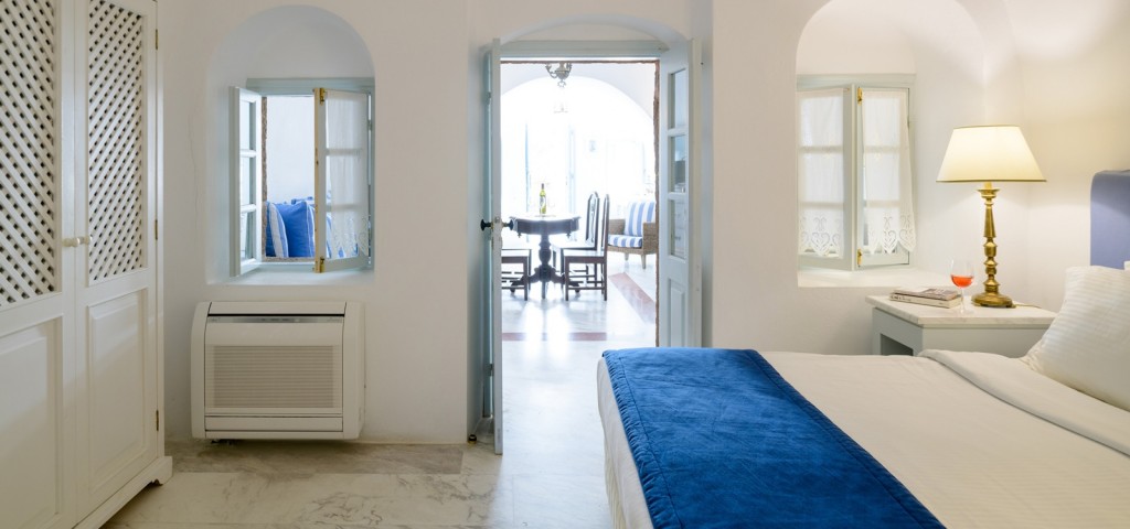 Elegant cave-style suite at Aigialos Santorini 